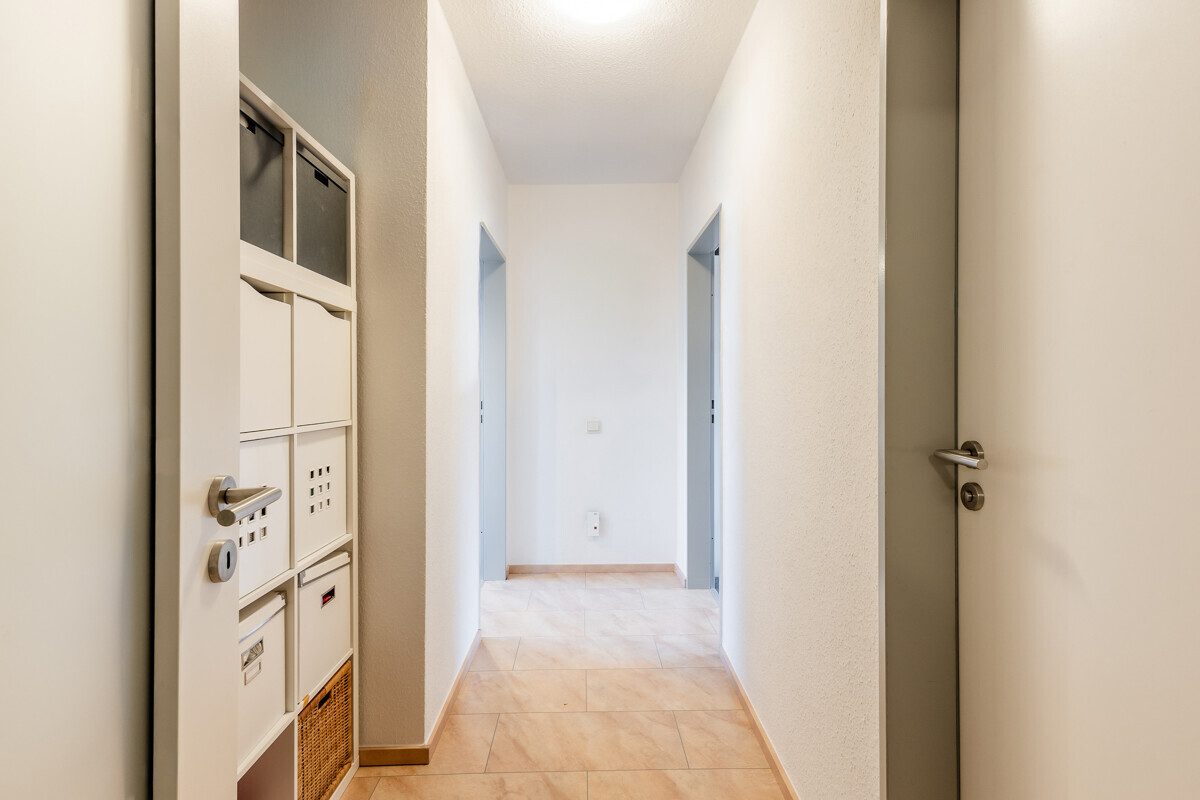 Flur im Dachgeschoss Immobilienangebot - Sendenhorst / Albersloh - Wohnen & Gewerbe - Hier ist Ihr Kapital gut investiert!