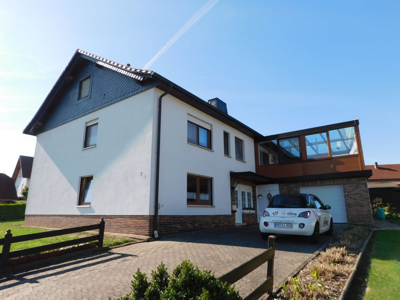 König Immobilien GmbH - Immobilienangebot - Felsberg - Einfamilienhaus mit Einliegerwohnung - Bezugsfertiges und großzügiges 1-2FH mit Garagen, Wintergarten uvm! Keine Käuferprovision!
