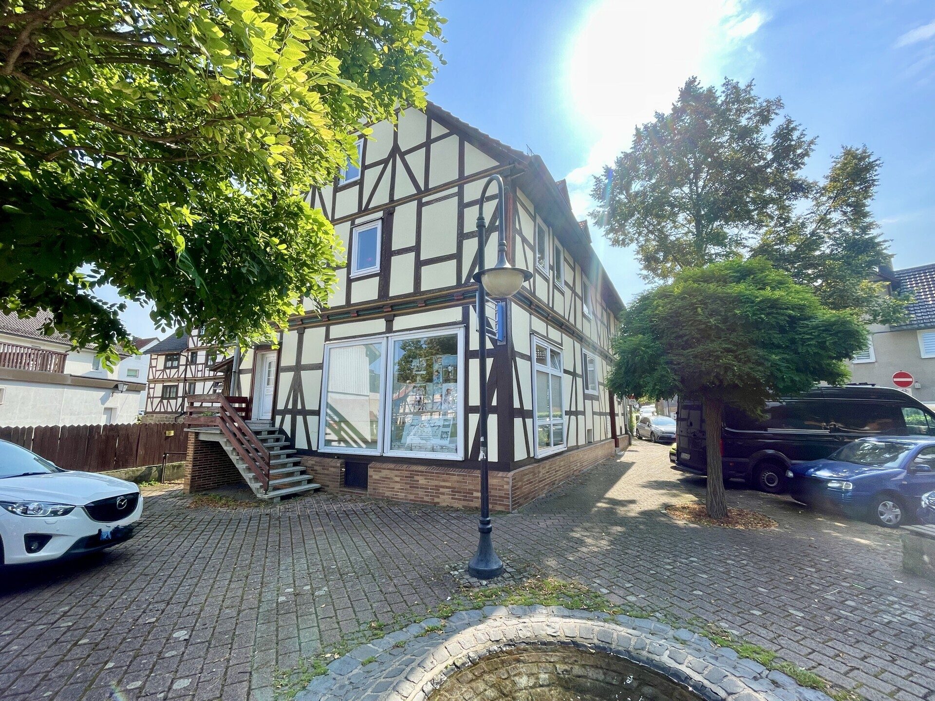 Immobilienangebot - Baunatal / Großenritte - Wohnen - Attraktive Steuervorteile möglich:
Wohn- und Geschäftshaus zentral in Großenritte!