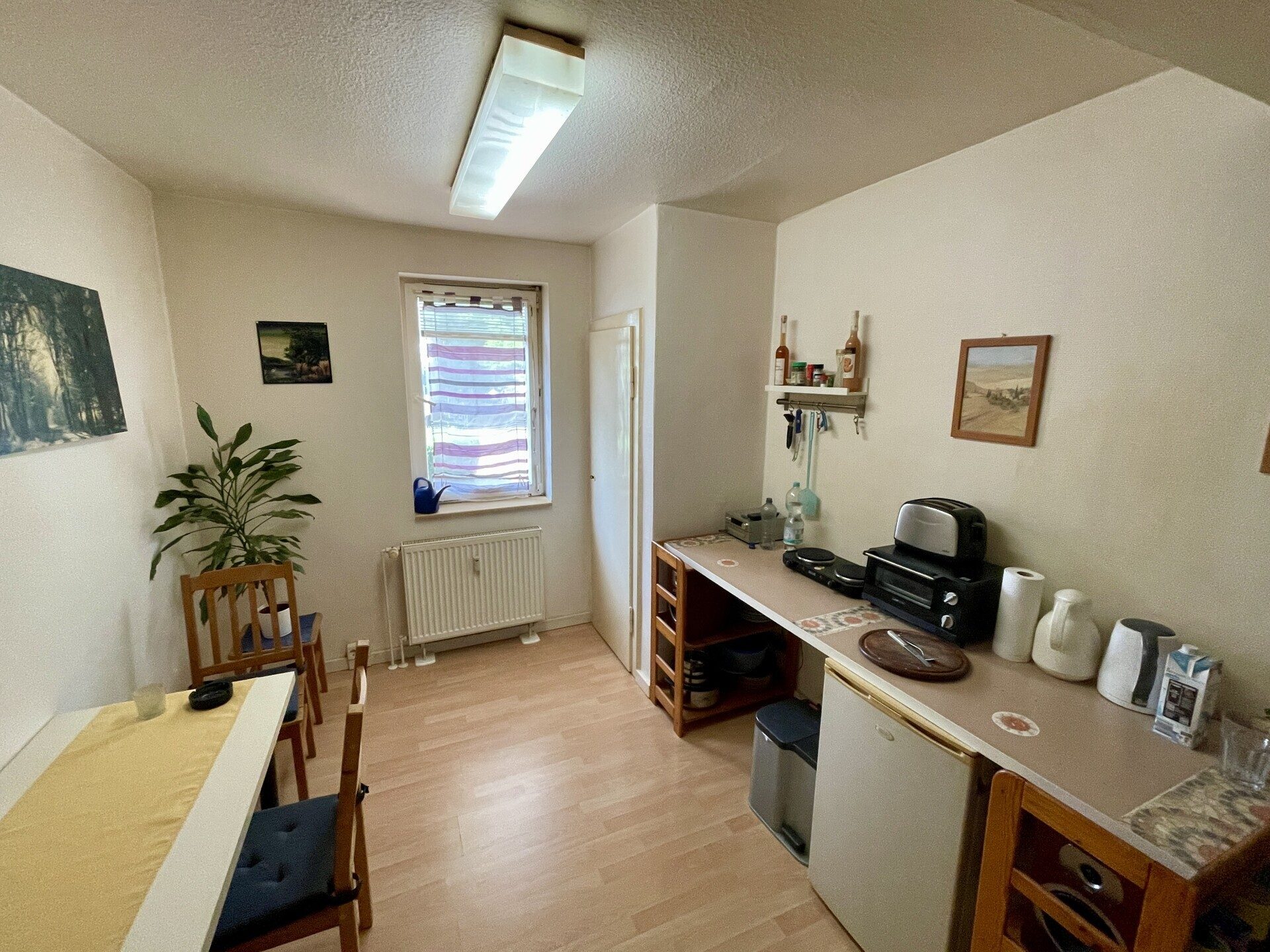 Immobilienangebot - Baunatal / Großenritte - Wohnen - Attraktive Steuervorteile möglich:
Wohn- und Geschäftshaus zentral in Großenritte!