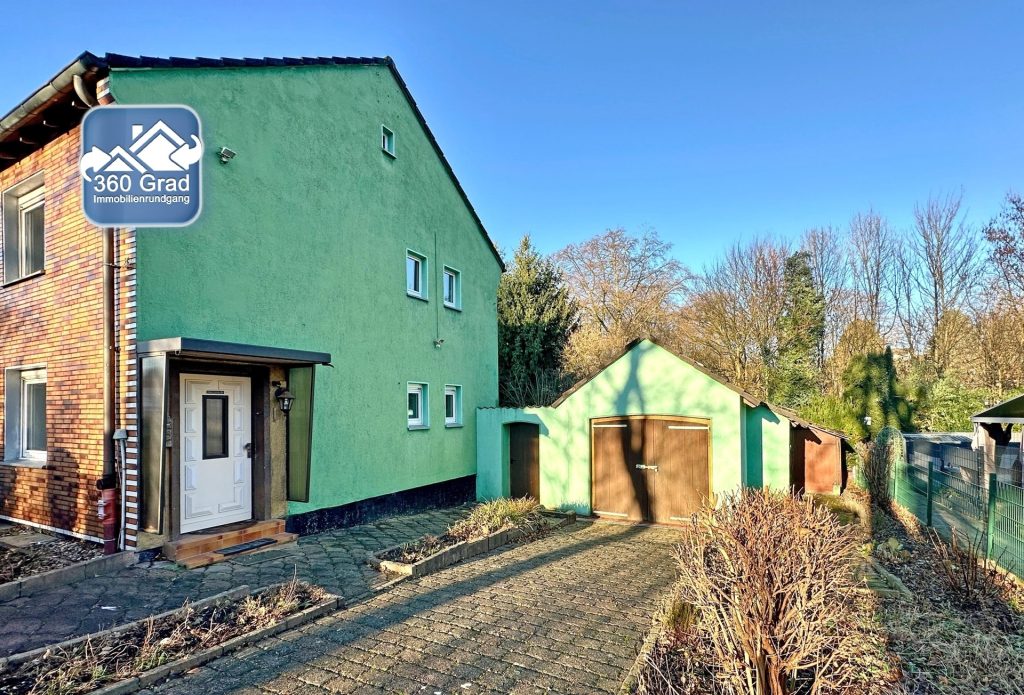 Seitenansicht / Zufahrt zur Garage Immobilienangebot - Bochum - Alle - Kompaktes Wohnen mit großem Potenzial
in Linden