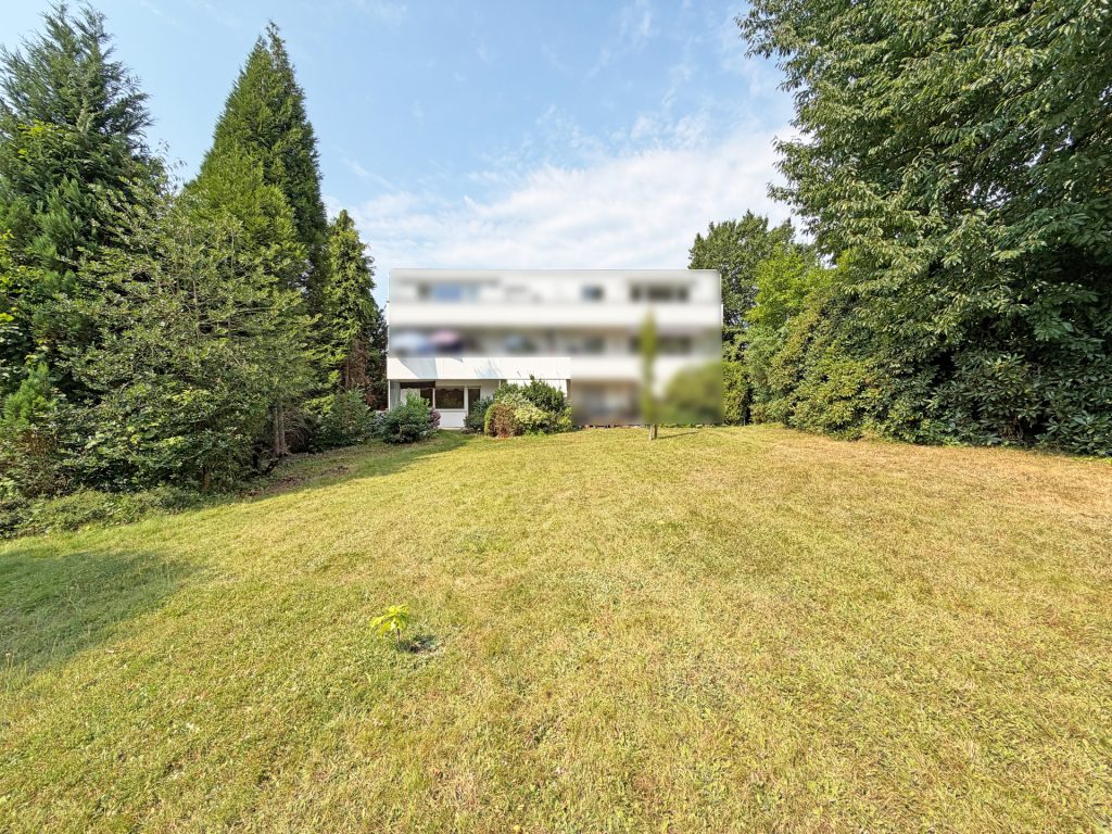Rückansicht mit Gemeinschaftsgarten Immobilienangebot - Bochum / Grumme - Alle - Einladende Terrassenwohnung
in Grumme