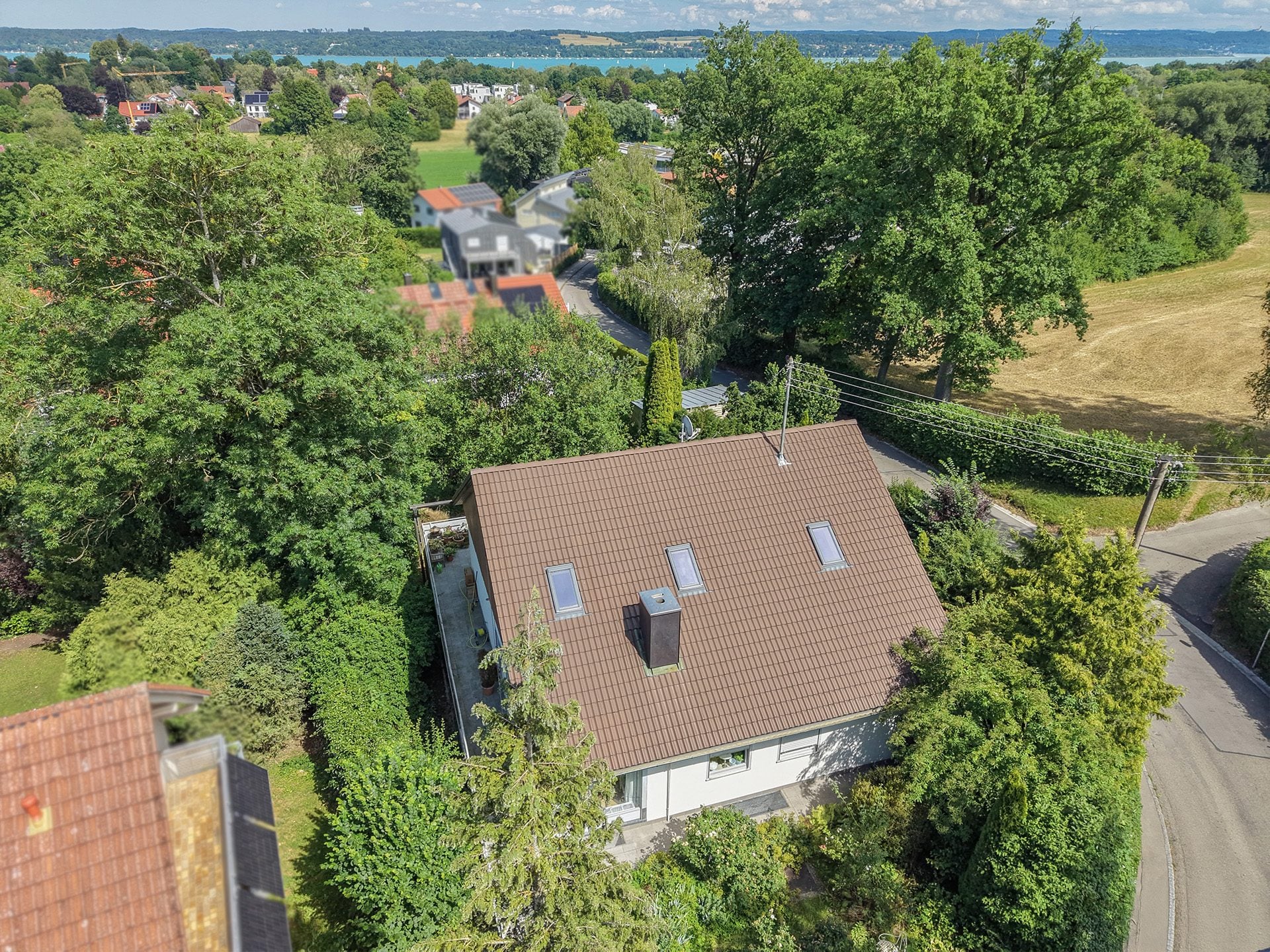 Veltrup Immobilien - Immobilienangebot - Schondorf am Ammersee - Bauplätze - EIN ORT FÜR VISONEN : GRUNDSTÜCK MIT HANGLAGE IN SCHONDORF
