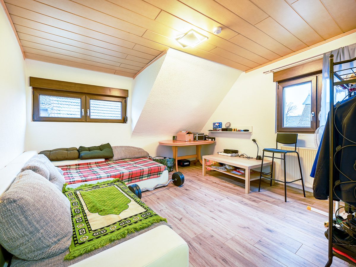 Immobilienangebot - Karlsbad / Langensteinbach - Wohnen & Anlage - Zwei Wohnungen, eine Investition: Vermietetes 2-Familien-Wohnhaus ideal für Kapitalanleger