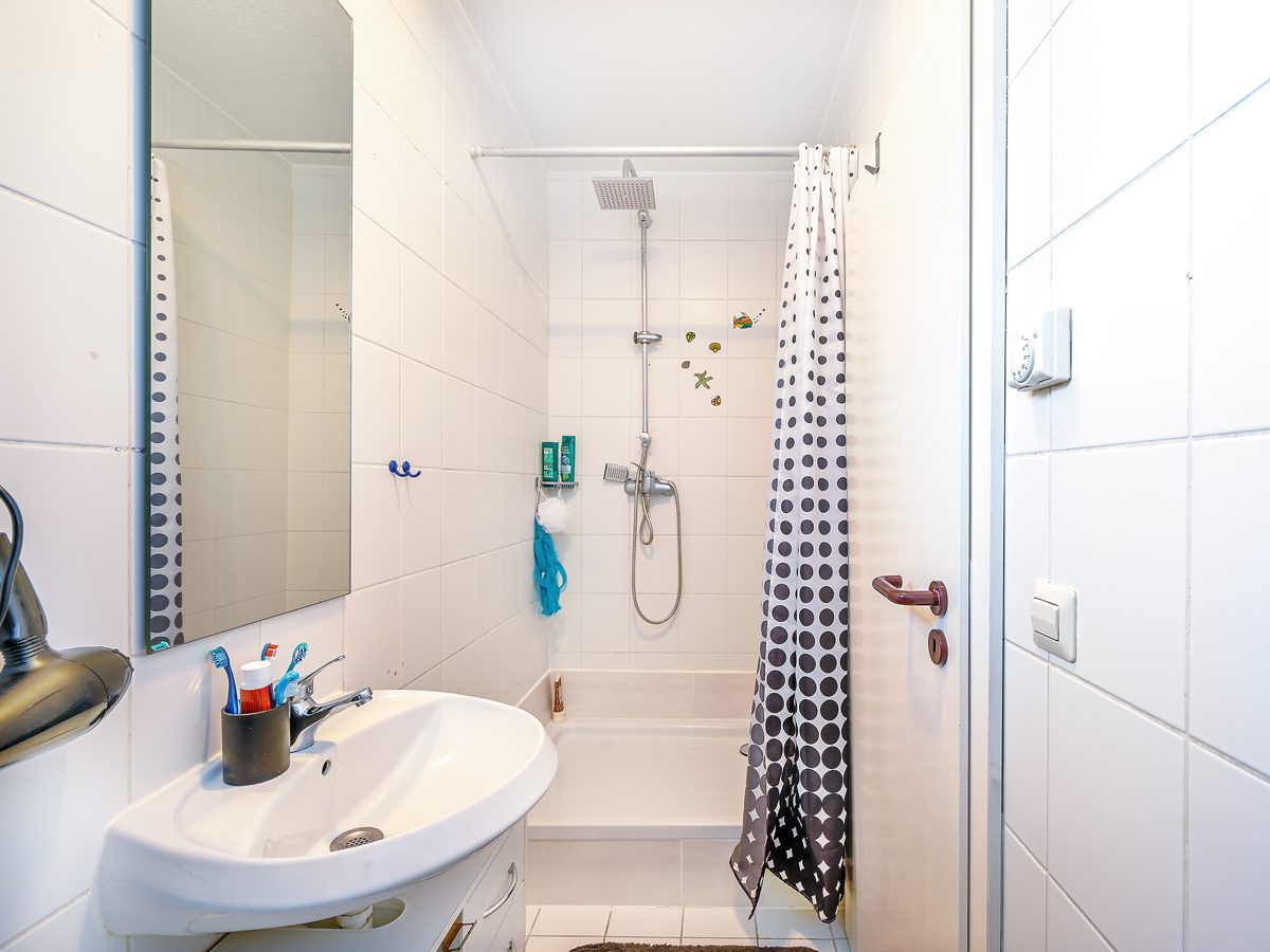 Immobilienangebot - Karlsdorf-Neuthard - Wohnungen - Vermietete Eigentumswohnung im Souterrain mit 2 Terrassen - Sichere Rendite für kluge Anleger