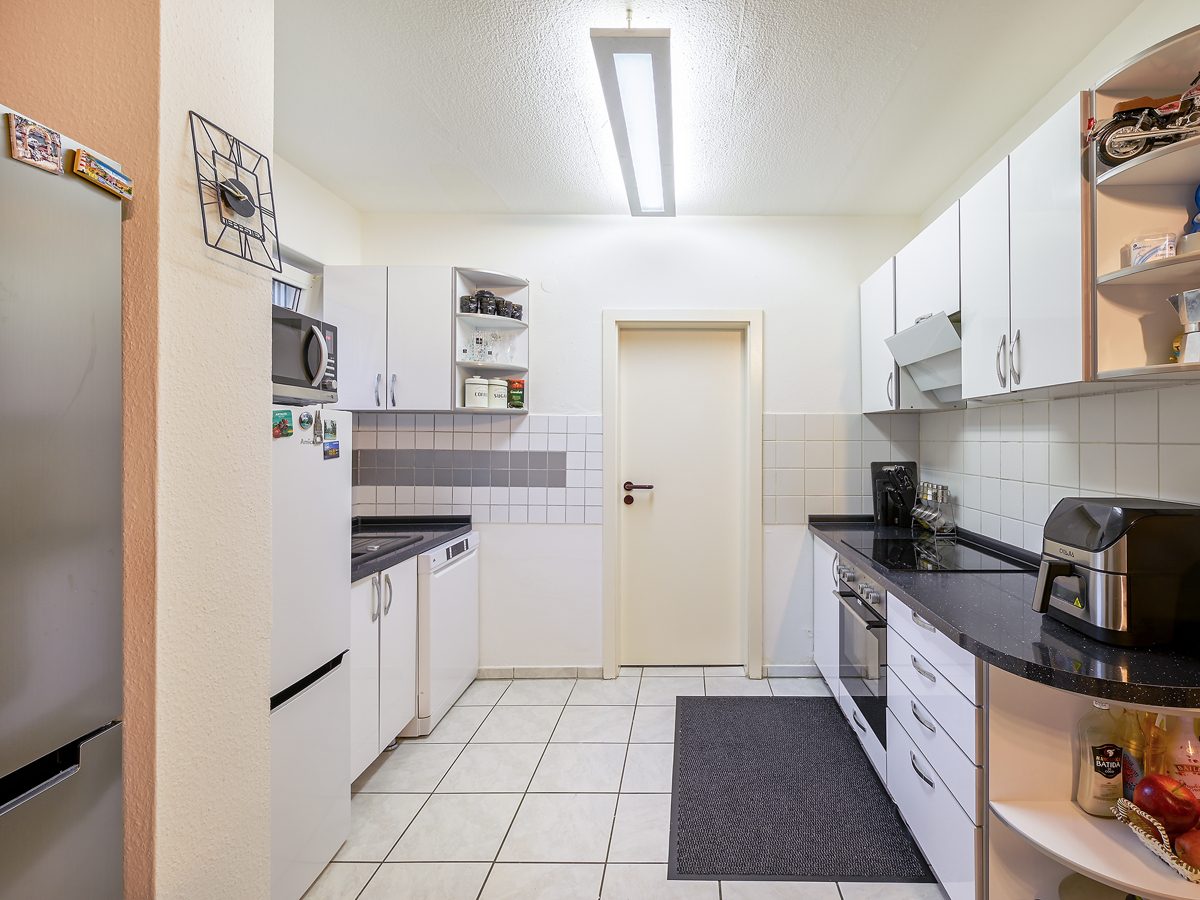 Immobilienangebot - Karlsdorf-Neuthard - Wohnungen - Vermietete Eigentumswohnung im Souterrain mit 2 Terrassen - Sichere Rendite für kluge Anleger