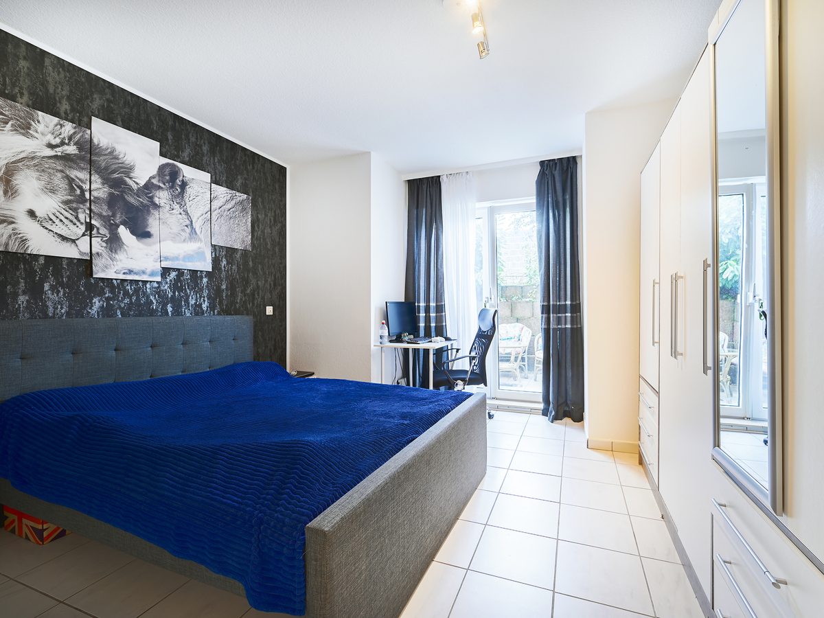 Immobilienangebot - Karlsdorf-Neuthard - Wohnungen - Vermietete Eigentumswohnung im Souterrain mit 2 Terrassen - Sichere Rendite für kluge Anleger