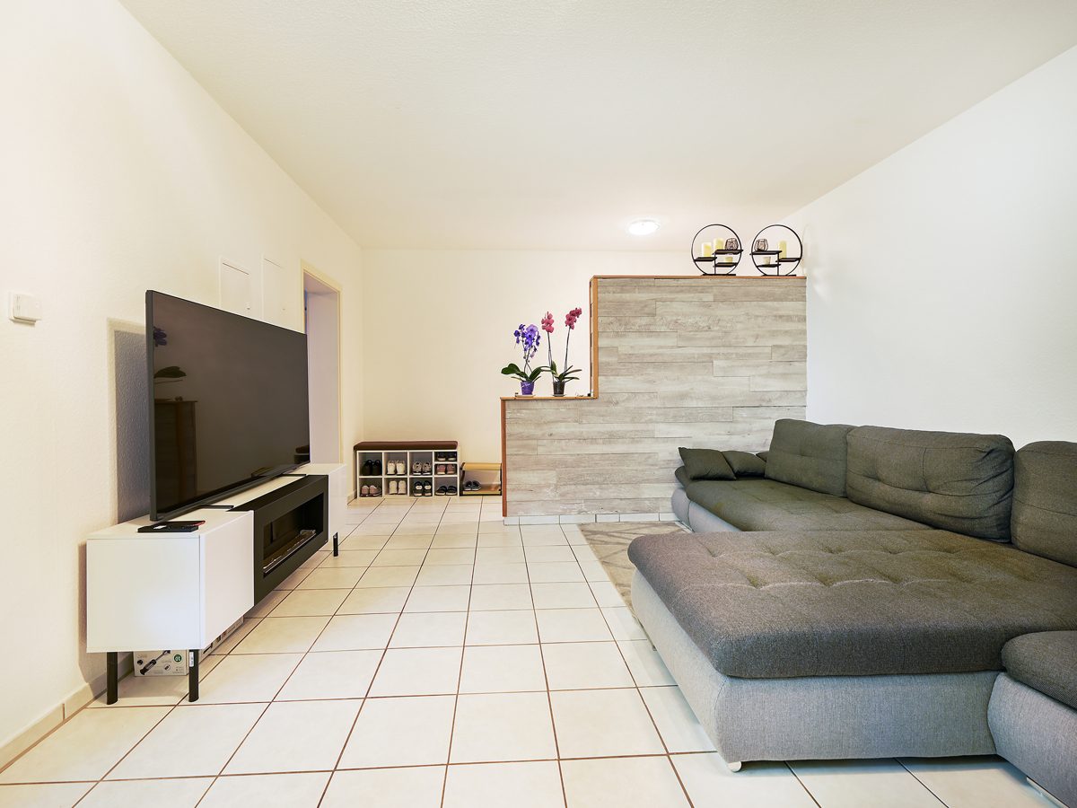Immobilienangebot - Karlsdorf-Neuthard - Wohnungen - Vermietete Eigentumswohnung im Souterrain mit 2 Terrassen - Sichere Rendite für kluge Anleger
