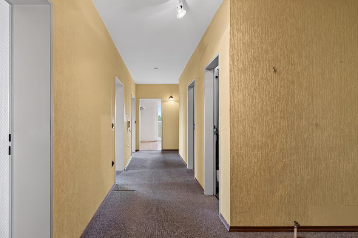 Flur Immobilienangebot - Eggenstein-Leopoldshafen / Leopoldshafen - Wohnungen - Flexibel wohnen mit Potenzial: 3,5- oder 4-Zimmer-Eigentumswohnung, entscheiden Sie selbst!