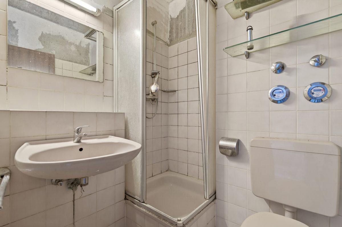 Immobilienangebot - Karlsruhe - Wohnungen - Kompakte 1-Zimmer-Wohnung mit Balkon, TG-Stellplatz und Sanierungspotenzial