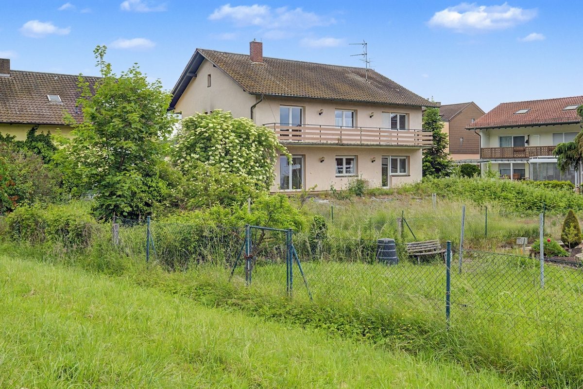 Rückansicht Immobilienangebot - Oberhausen-Rheinhausen / Rheinhausen - Wohnen & Anlage - Ein Haus, viele Möglichkeiten – wohnen, vermieten oder beides verbinden