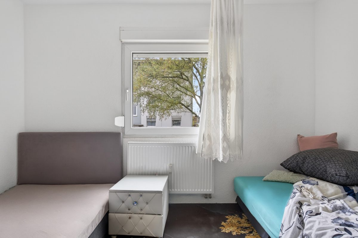 Immobilienangebot - Linkenheim-Hochstetten / Linkenheim - Wohnungen - Vermietete, sanierte Hochparterrewohnung mit Balkon – attraktive Kapitalanlage