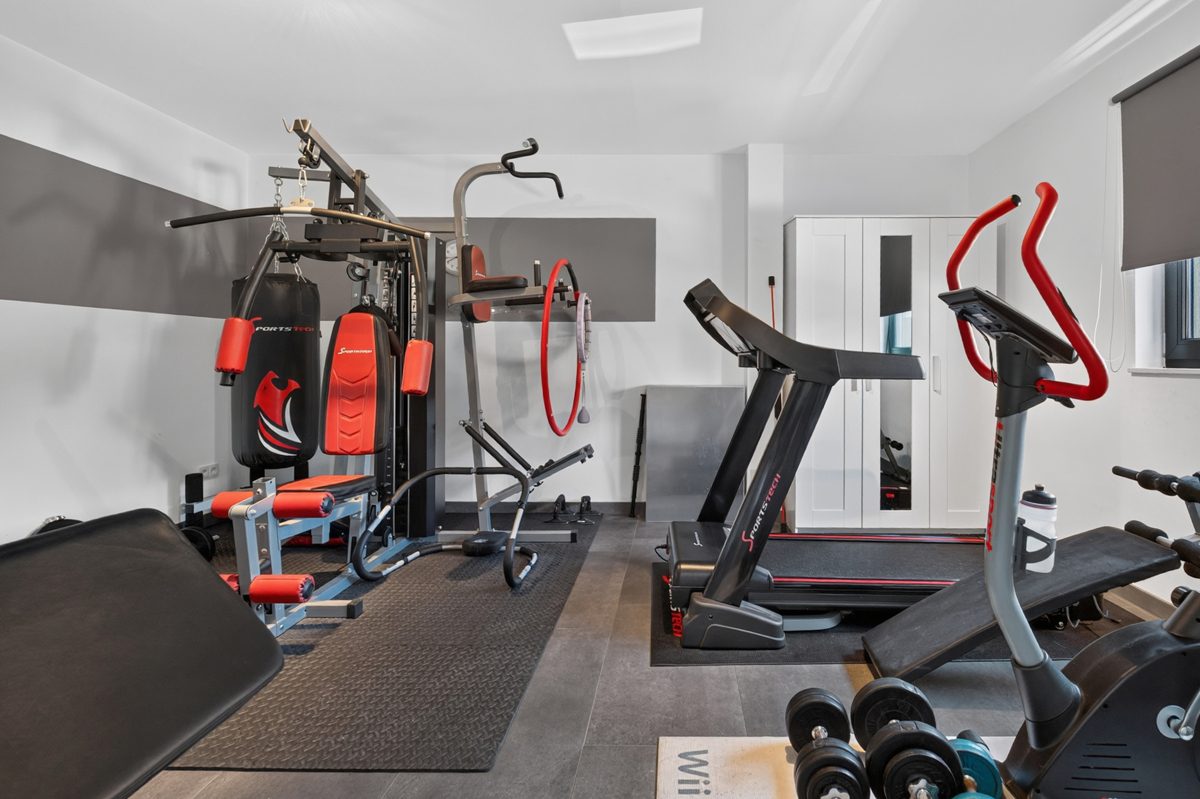 Fitnessraum EG Immobilienangebot - Pfinztal / Söllingen - Wohnen & Anlage - Modern. Großzügig. Vielseitig. - Attraktives Einfamilienhaus mit großem Garten und Ausbaupotenzial!