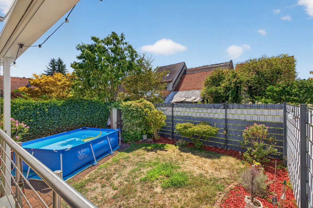 Immobilienangebot - Dettenheim / Rußheim - Wohnen & Anlage - Rückzugsort für die ganze Familie – Einfamilienhaus mit Garten, Kaminofen und flexiblem Nebengebäude