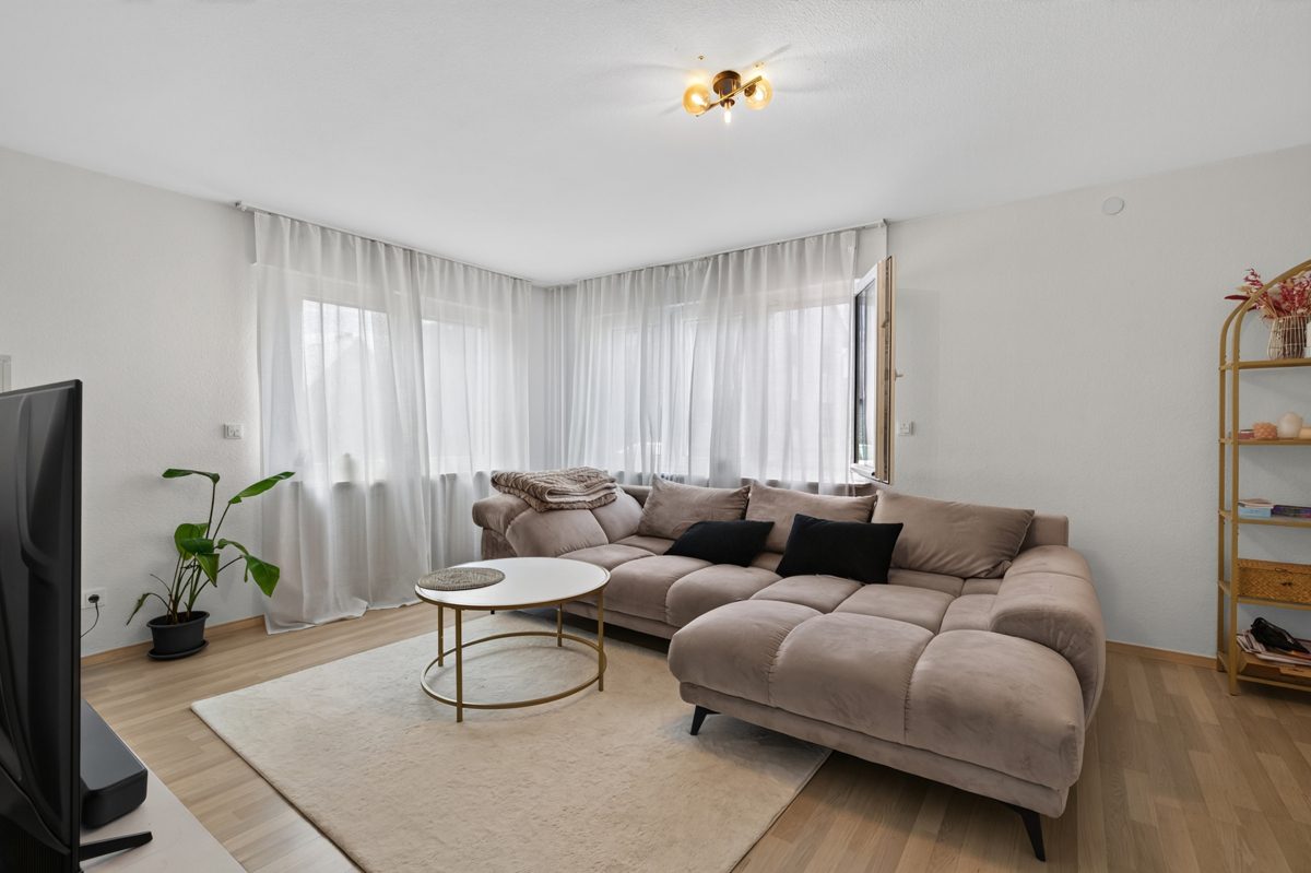 Wohnzimmer im EG Immobilienangebot - Rheinstetten / Mörsch - Wohnen & Anlage - Kapitalanlage mit Zukunft - Ihr Zweifamilienhaus mit Perspektive