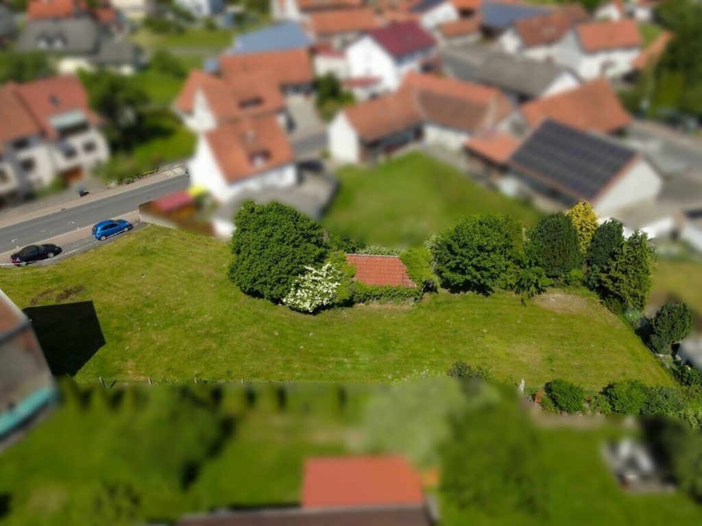 Luftaufnahme Seitenansicht VR Immobilien GmbH - Immobilienangebot - Kalbach - Grundstücke - RESERVIERT: Verwirklichen Sie Ihren Wohntraum: Großzügiges Baugrundstück in Mittelkalbach
