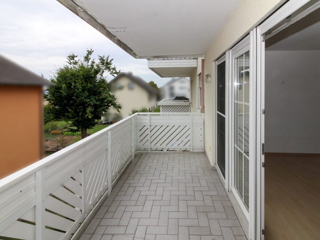 VR Immobilien GmbH - Immobilienangebot - Petersberg - Alle - Gepflegte 3-Zimmer-Wohnung mit Balkon und Tiefgaragenstellplatz in Petersberg