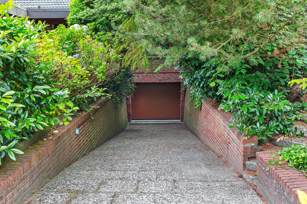 Immobilienangebot - Hamburg / Rahlstedt - Alle - Großzügiger Bungalow mit traumhaftem Garten, Garage und vielseitig nutzbarem Untergeschoss in ruhiger Lage