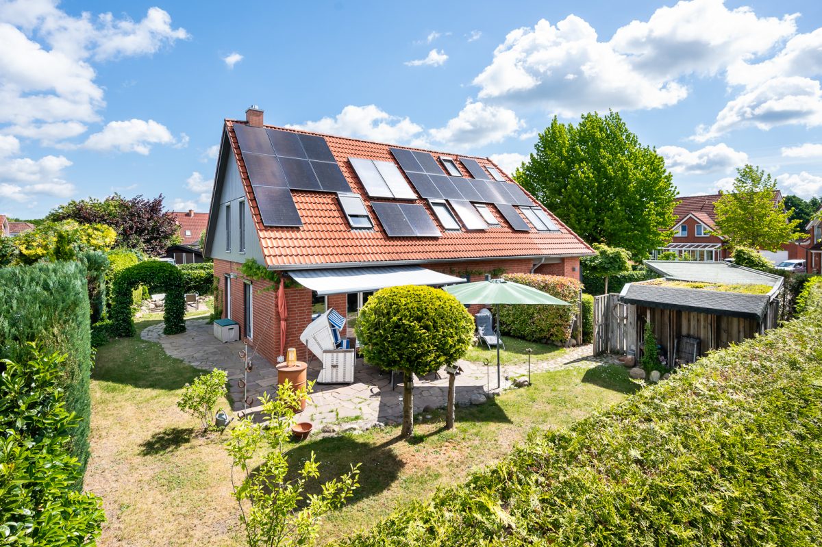 Immobilienangebot - Lübeck - Alle - Familienglück: Traumhaftes Einfamilienhaus mit herrlichem Garten und erstklassiger Ausstattung