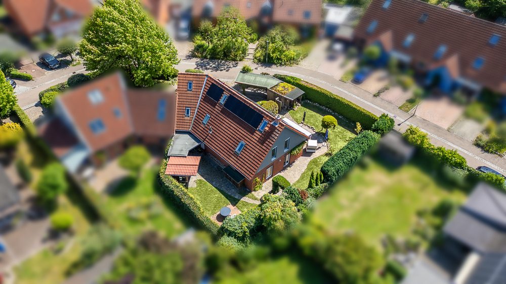 Immobilienangebot - Lübeck - Alle - Familienglück: Traumhaftes Einfamilienhaus mit herrlichem Garten und erstklassiger Ausstattung