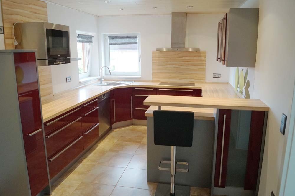 HUST Immobilien GmbH & Co. KG - Immobilienangebot - Stutensee - Wohnung - Helle 4-Zimmer-Wohnung mit Einbauküche, Stellplatz und Gartenmitbenutzung in Stutensee-Spöck