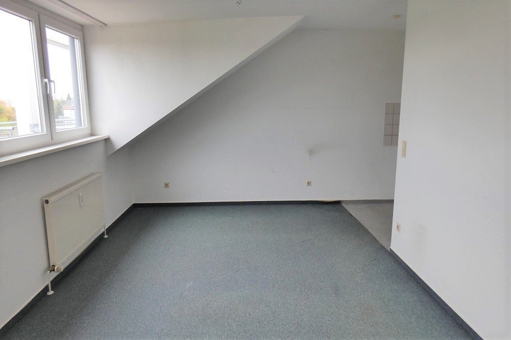 HUST Immobilien GmbH & Co. KG - Immobilienangebot - Karlsruhe - Haus - Sofort bezugsfreie 2-Zimmer-Wohnung mit TG-Stellplatz in Karlsruhe-Hagsfeld