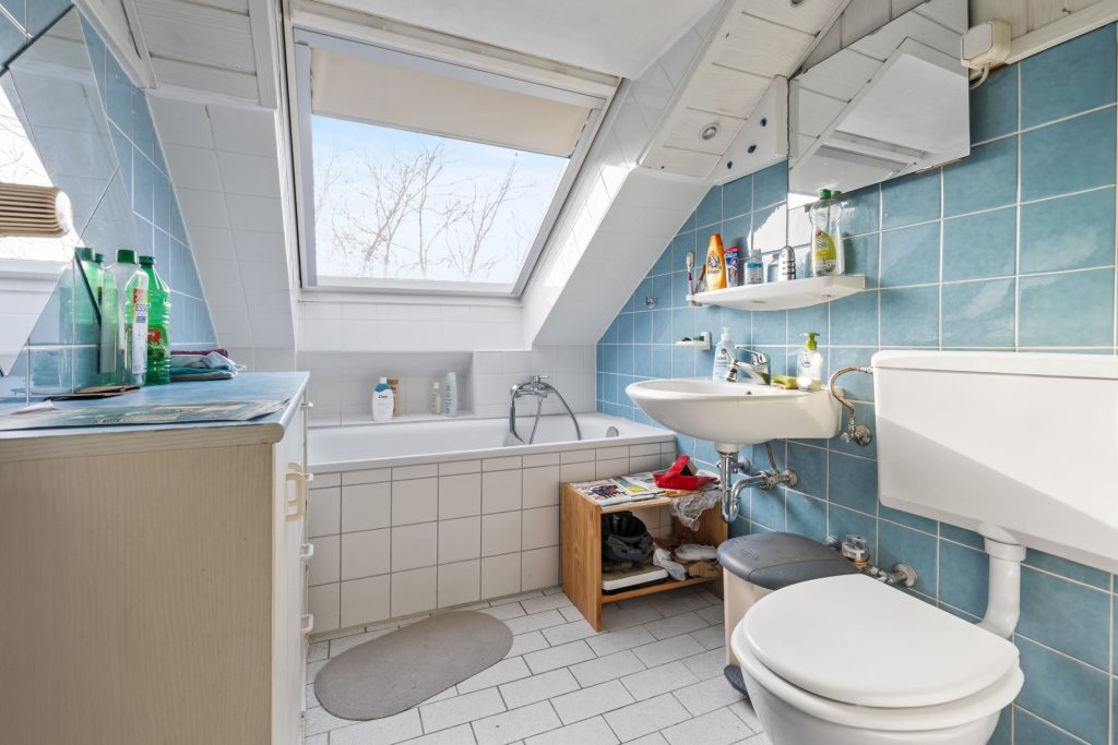 HUST Immobilien GmbH & Co. KG - Immobilienangebot - Karlsruhe / Wolfartsweier - Alle - Kapitalanlage! 10 Wohnungen im Paket in 12- Familienhaus mit Stellplätzen und Garage