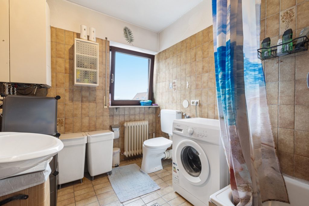 HUST Immobilien GmbH & Co. KG - Immobilienangebot - Sinzheim / Kartung - Alle - Gepflegtes Mehrfamilienhaus mit 12 Wohnungen in Sinzheim / Kartung bei Baden-Baden