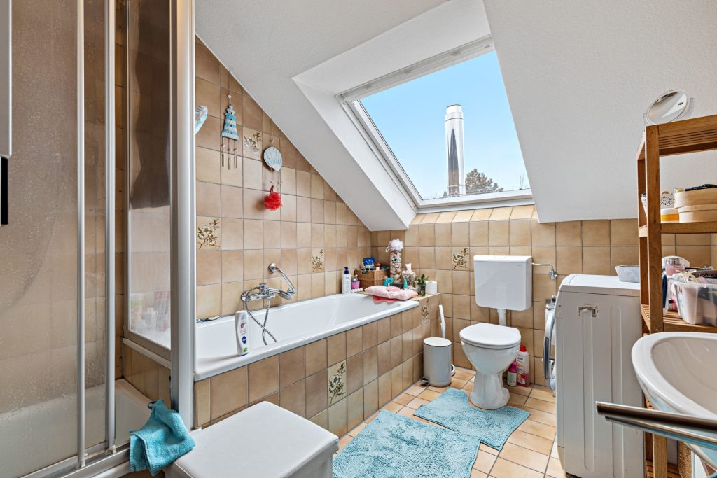 HUST Immobilien GmbH & Co. KG - Immobilienangebot - Sinzheim / Kartung - Alle - Gepflegtes Mehrfamilienhaus mit 12 Wohnungen in Sinzheim / Kartung bei Baden-Baden