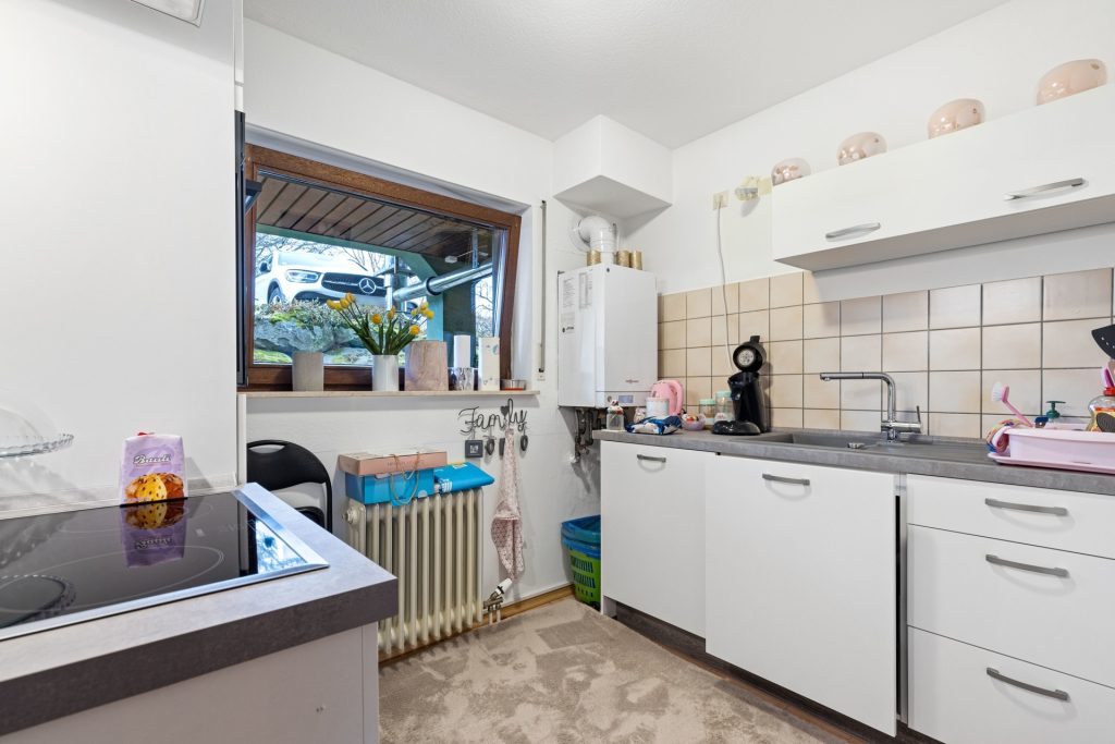 HUST Immobilien GmbH & Co. KG - Immobilienangebot - Sinzheim / Kartung - Alle - Gepflegtes Mehrfamilienhaus mit 12 Wohnungen in Sinzheim / Kartung bei Baden-Baden