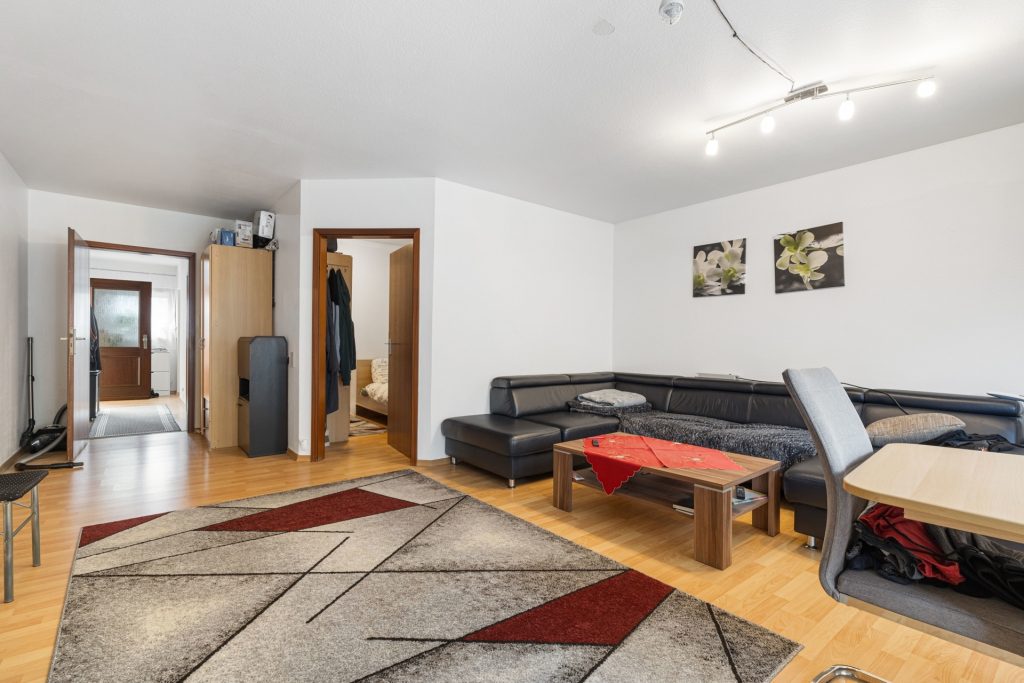 HUST Immobilien GmbH & Co. KG - Immobilienangebot - Sinzheim / Kartung - Alle - Gepflegtes Mehrfamilienhaus mit 12 Wohnungen in Sinzheim / Kartung bei Baden-Baden