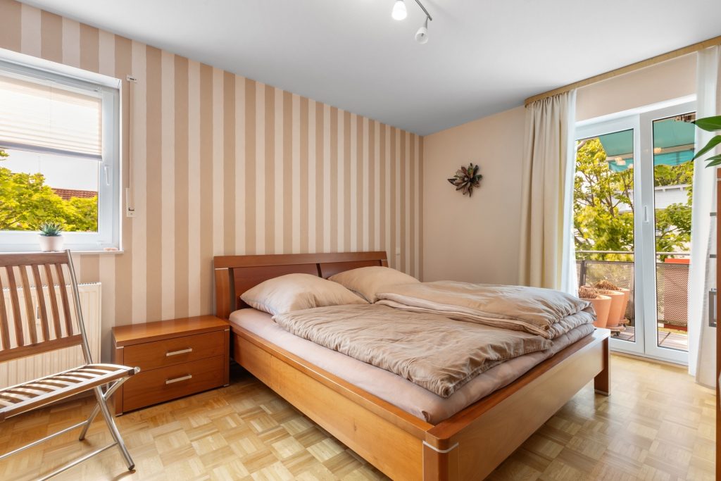 HUST Immobilien GmbH & Co. KG - Immobilienangebot - Stutensee / Blankenloch - Alle - Kapitalanlage in Stutensee – Vermietete 2-Zimmer-Wohnung mit Balkon & Stellplätzen