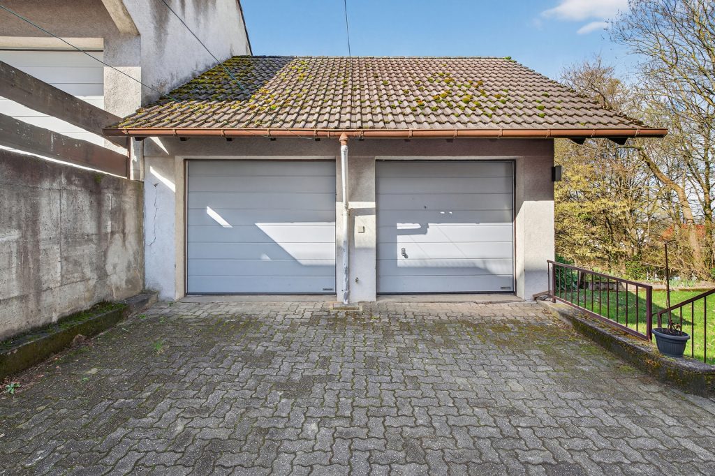 HUST Immobilien GmbH & Co. KG - Immobilienangebot - Malsch - Alle - Idyllisches Wohnen am Waldrand: Vielseitiges Mehrfamilienhaus auf 620 m² Grund