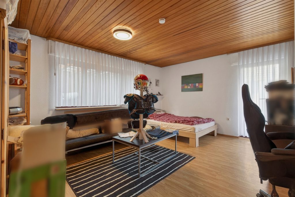 HUST Immobilien GmbH & Co. KG - Immobilienangebot - Malsch - Alle - Idyllisches Wohnen am Waldrand: Vielseitiges Mehrfamilienhaus auf 620 m² Grund