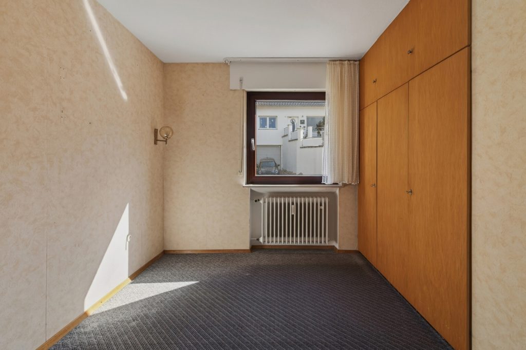 HUST Immobilien GmbH & Co. KG - Immobilienangebot - Malsch - Alle - Idyllisches Wohnen am Waldrand: Vielseitiges Mehrfamilienhaus auf 620 m² Grund
