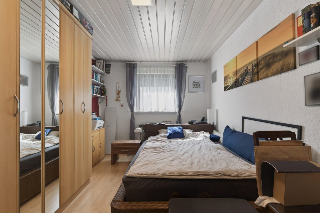 HUST Immobilien GmbH & Co. KG - Immobilienangebot - Malsch - Alle - Idyllisches Wohnen am Waldrand: Vielseitiges Mehrfamilienhaus auf 620 m² Grund