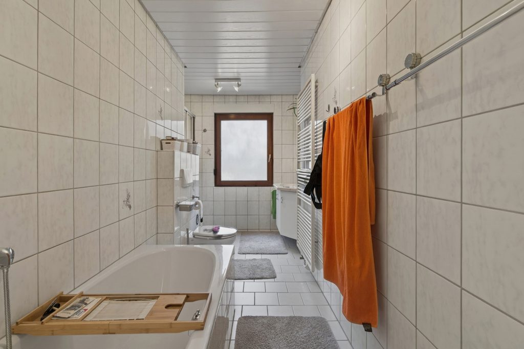 HUST Immobilien GmbH & Co. KG - Immobilienangebot - Malsch - Alle - Idyllisches Wohnen am Waldrand: Vielseitiges Mehrfamilienhaus auf 620 m² Grund