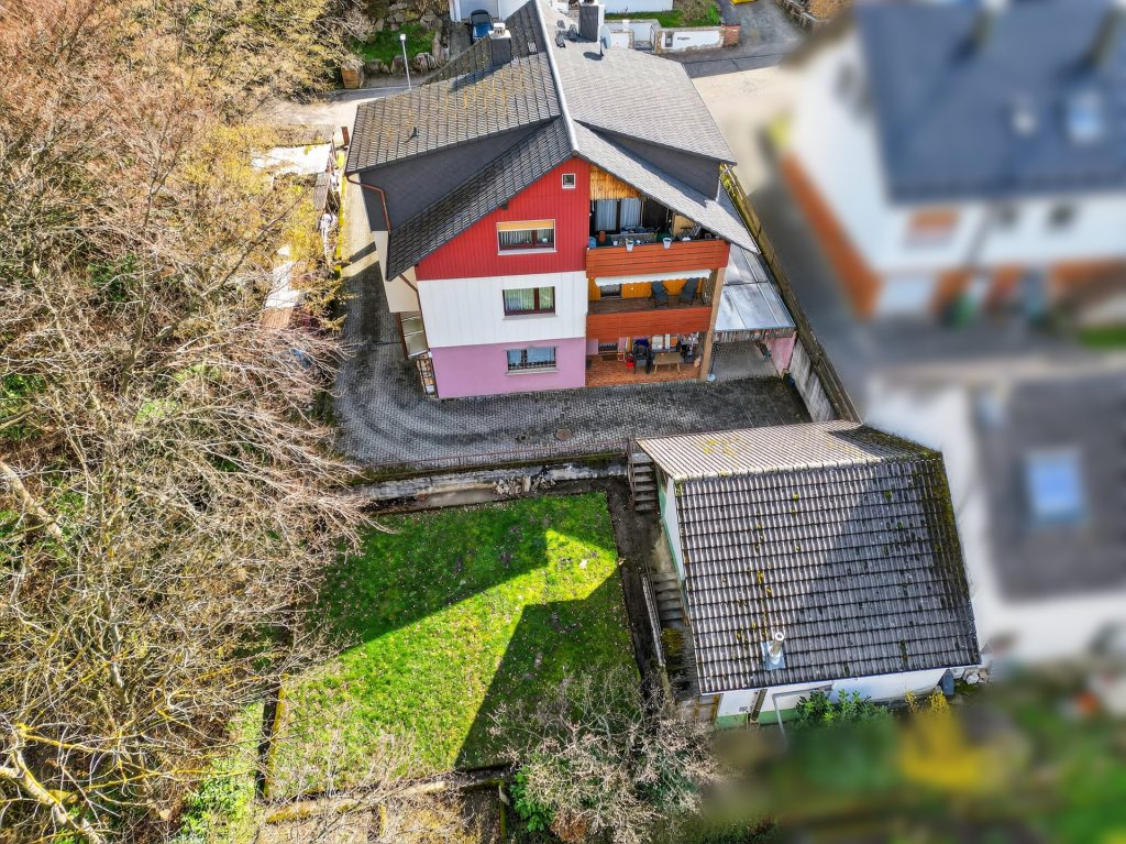 HUST Immobilien GmbH & Co. KG - Immobilienangebot - Malsch - Alle - Idyllisches Wohnen am Waldrand: Vielseitiges Mehrfamilienhaus auf 620 m² Grund