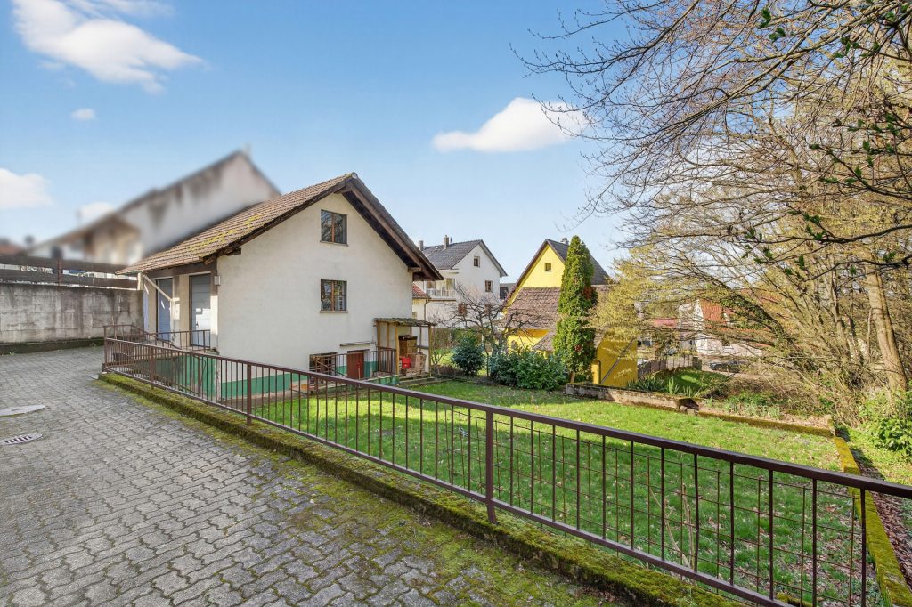 HUST Immobilien GmbH & Co. KG - Immobilienangebot - Malsch - Alle - Idyllisches Wohnen am Waldrand: Vielseitiges Mehrfamilienhaus auf 620 m² Grund