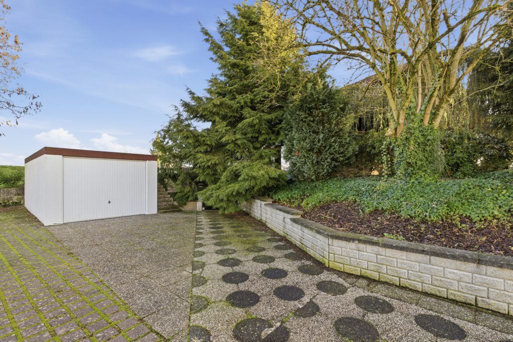 HUST Immobilien GmbH & Co. KG - Immobilienangebot - Kuppenheim - Alle - Ein Ort zum Ankommen – Einfamilienhaus mit einzigartiger Architektur und Blick ins Grüne