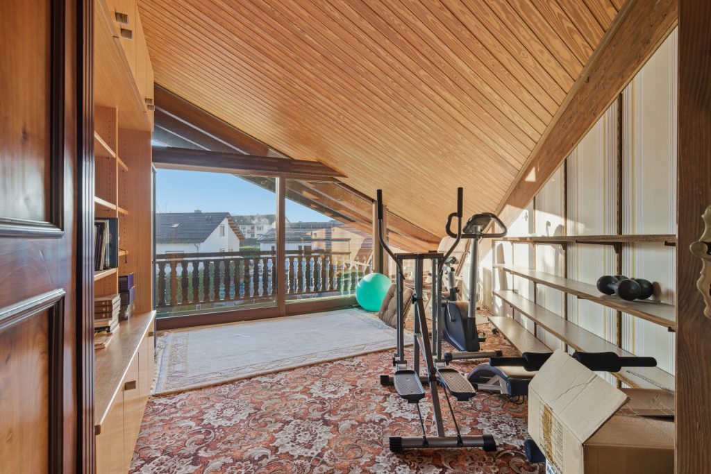 HUST Immobilien GmbH & Co. KG - Immobilienangebot - Kuppenheim - Alle - Ein Ort zum Ankommen – Einfamilienhaus mit einzigartiger Architektur und Blick ins Grüne