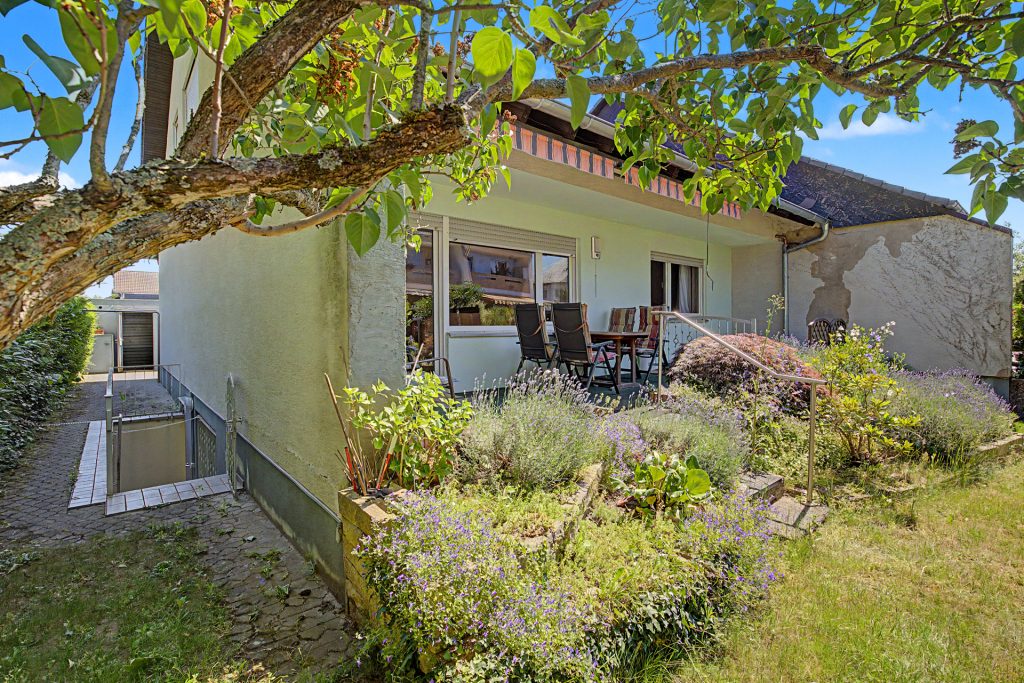 HUST Immobilien GmbH & Co. KG - Immobilienangebot - Eggenstein-Leopoldshafen - Alle - Einfamilienhaus mit Garten, Garage & viel Potenzial in Eggenstein-Leopoldshafen