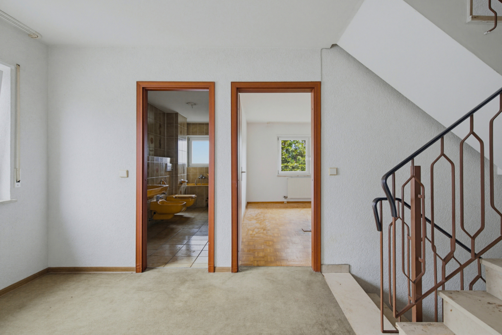 HUST Immobilien GmbH & Co. KG - Immobilienangebot - Stutensee - Alle - Sanierungsbedürftiges Reihenendhaus mit Garten und viel Potenzial in Stutensee-Friedrichstal