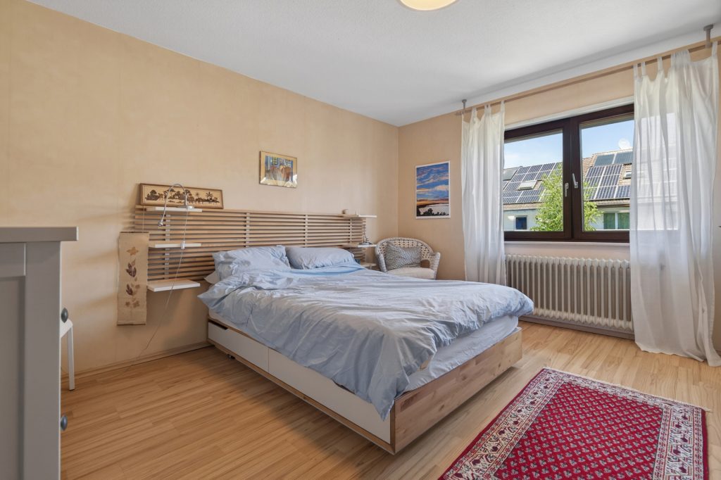 HUST Immobilien GmbH & Co. KG - Immobilienangebot - Stutensee / Spöck - Alle - Raum für die ganze Familie – gepflegtes Reihenmittelhaus mit Garten und Garage in Stutensee-Spöck