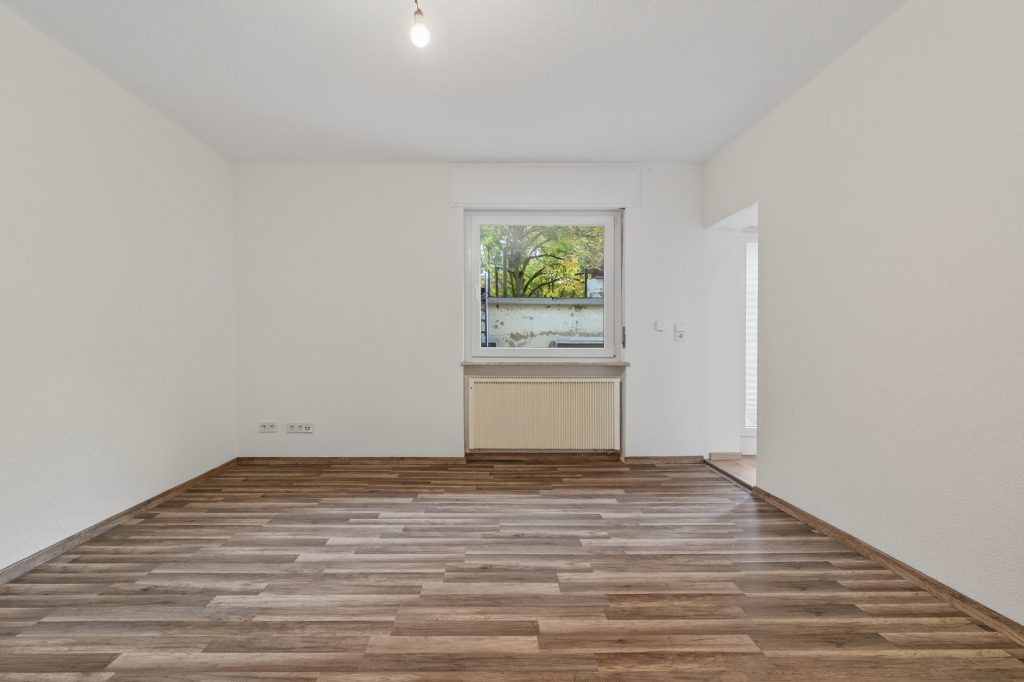 HUST Immobilien GmbH & Co. KG - Immobilienangebot - Karlsruhe / Knielingen - Wohnungen - 3-Zimmer-Erdgeschosswohnung mit Terrasse und Garage in ruhiger Lage