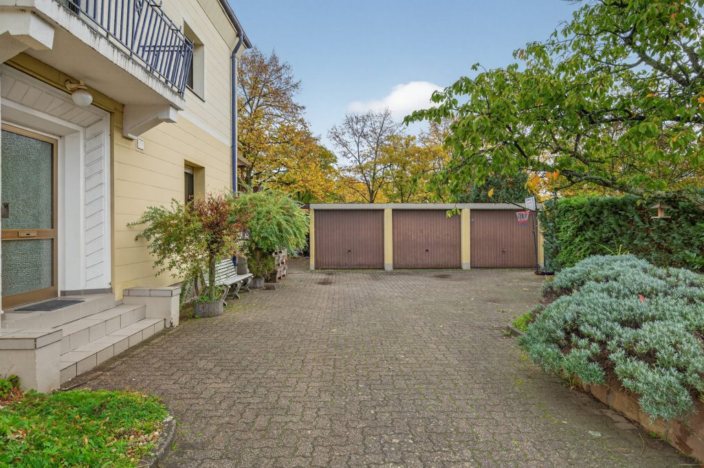 HUST Immobilien GmbH & Co. KG - Immobilienangebot - Karlsruhe / Knielingen - Wohnungen - 3-Zimmer-Erdgeschosswohnung mit Terrasse und Garage in ruhiger Lage