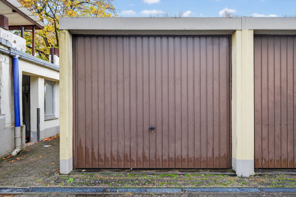 HUST Immobilien GmbH & Co. KG - Immobilienangebot - Karlsruhe / Knielingen - Wohnungen - 3-Zimmer-Erdgeschosswohnung mit Terrasse und Garage in ruhiger Lage