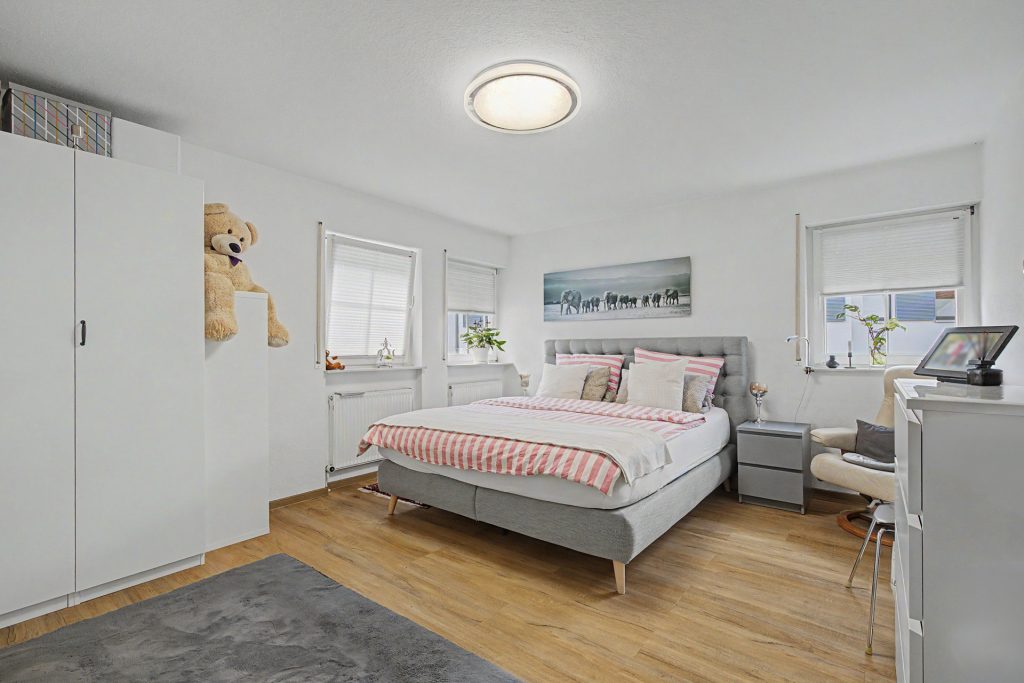 HUST Immobilien GmbH & Co. KG - Immobilienangebot - Rheinstetten / Forchheim - Alle - Vermietete 3-Zimmer-Wohnung mit sonnigem Balkon und TG-Stellplatz in Rheinstetten-Forchheim