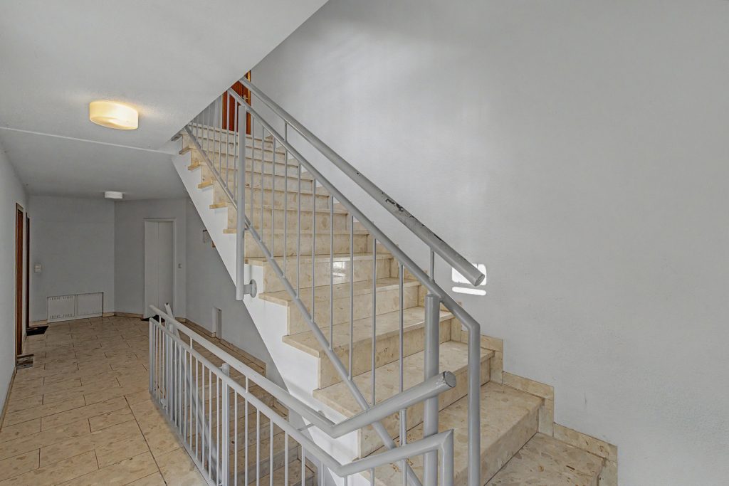 HUST Immobilien GmbH & Co. KG - Immobilienangebot - Rheinstetten / Forchheim - Alle - Vermietete 3-Zimmer-Wohnung mit sonnigem Balkon und TG-Stellplatz in Rheinstetten-Forchheim