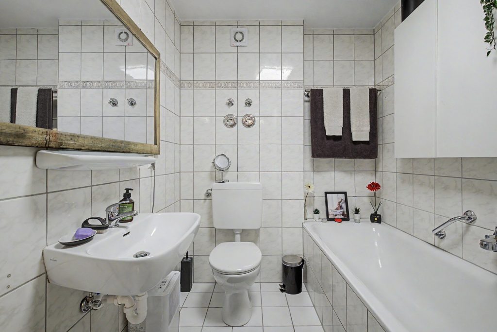 HUST Immobilien GmbH & Co. KG - Immobilienangebot - Rheinstetten / Forchheim - Alle - Vermietete 3-Zimmer-Wohnung mit sonnigem Balkon und TG-Stellplatz in Rheinstetten-Forchheim
